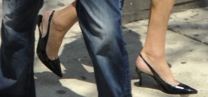 Caitlyn Jenner steps out in classic black patent slingback pumps with pointed toes and a modest kitten heel while walking through Manhattan