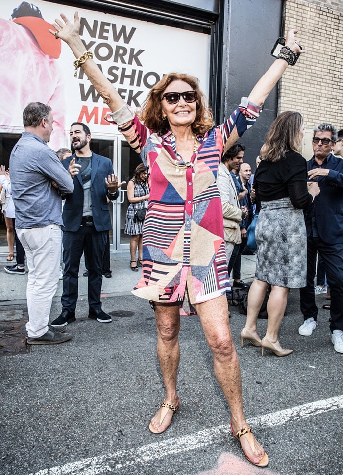 Diane von Fürstenberg celebrates the launch of New York Fashion Week: Men’s in a colorful geometric shirt dress, finishing the look with relaxed animal-print sandals that embody her signature effortless chic