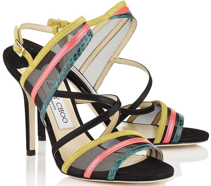 Jimmy Choo’s Visby sandals showcase a playful mix of multicolored leather, glossy snakeskin accents, and sheer mesh straps, finished with a sleek stiletto heel that captures the bold experimentation of mid-2010s luxury footwear