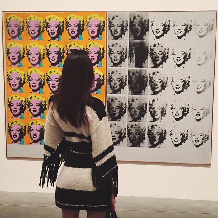 Kendall takes in an Andy Warhol exhibition, her fringed black-and-white dress echoing the graphic repetition of the iconic artwork