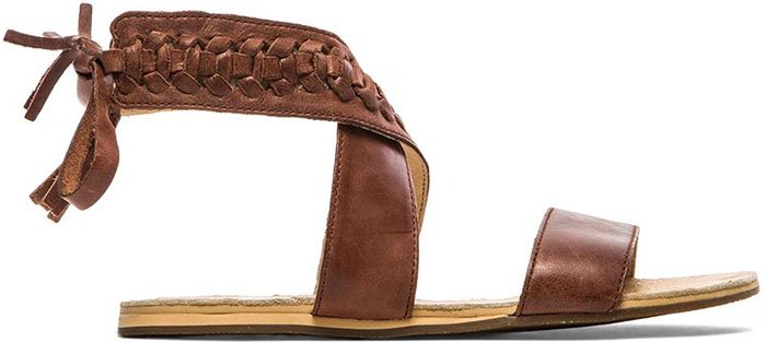Koolaburra’s “Alexa” gladiator sandal features soft brown leather straps with a braided ankle detail, capturing the laid-back bohemian aesthetic the now-sunset label was known for