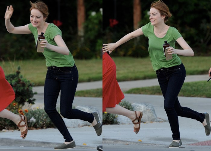 Emma styled a casual green T-shirt with black skinny jeans and finished the look with classic green TOMS slip-on shoes