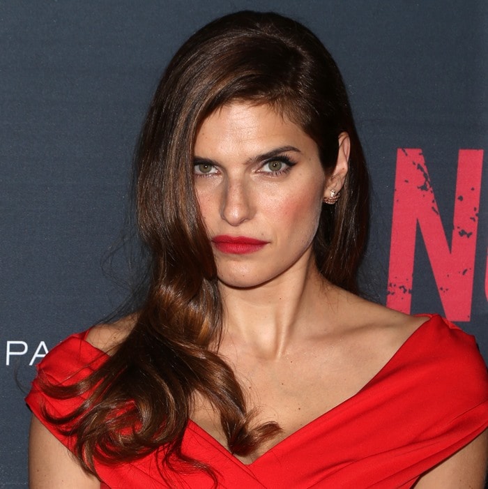 Lake Bell wears crimson lipstick and side-swept hair at the No Escape premiere