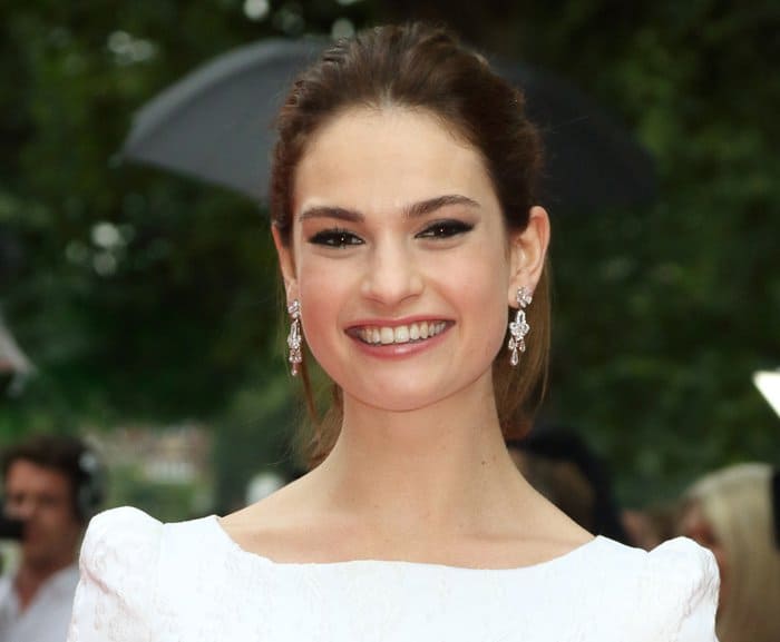 Lily James radiates elegance as she attends the BAFTA celebration of 'Downton Abbey' at Richmond Theatre on August 11, 2015, in Richmond, England