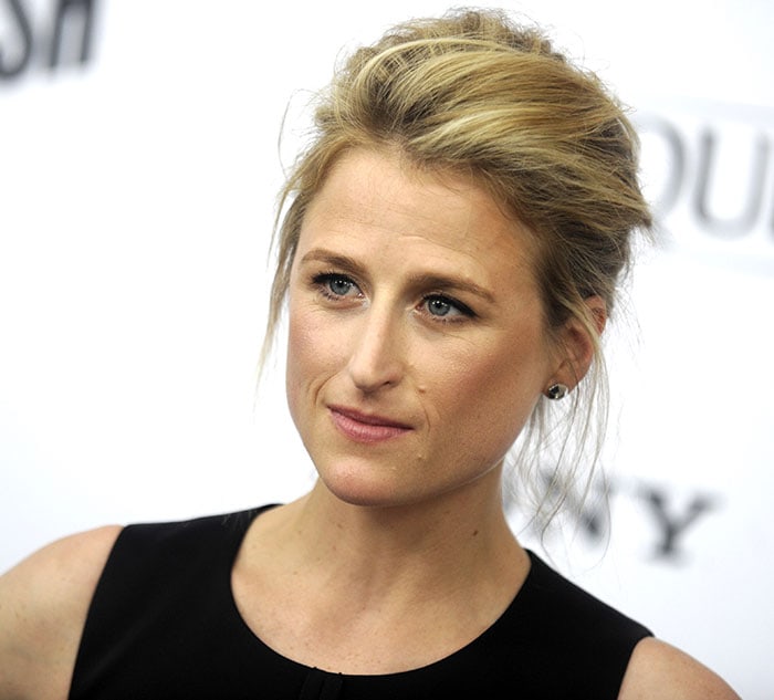 Mamie Gummer's blonde hair was swept up into a messy updo