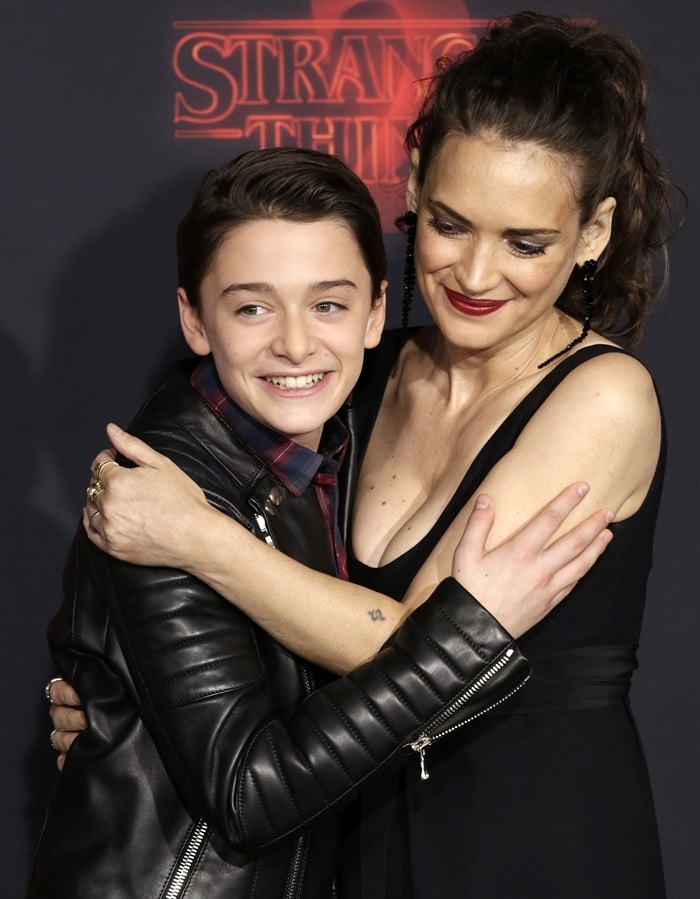 Winona Ryder shares a warm red-carpet hug with her Stranger Things co-star Noah Schnapp