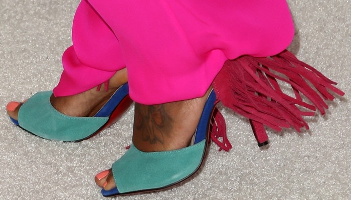 The Christian Louboutin Otrot sandals combined turquoise, cobalt, chartreuse, and dramatic fuchsia fringe for a footwear design that demanded attention from every angle