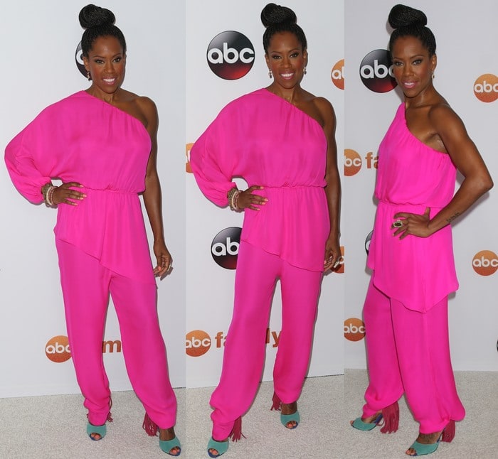 Regina King embraced color-block styling in a bright pink Tamara Mellon jumpsuit and statement Christian Louboutin Otrot fringe sandals