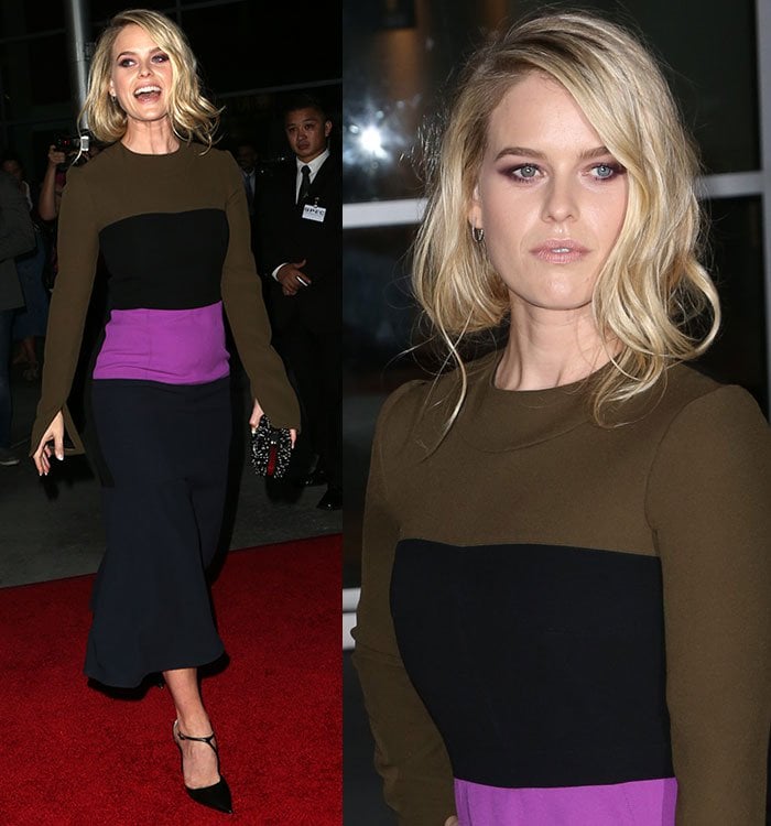 The dress's oversized sleeves and boxy silhouette overshadowed Alice Eve's figure, while her vampy black pointed-toe pumps and embellished clutch added hints of elegance to an otherwise unflattering look