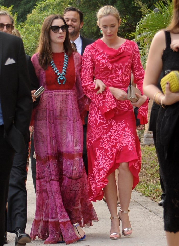 Anne Hathaway in a Valentino Spring 2017 maxi dress with cobalt heels and turquoise jewelry joined Emily Blunt, who stunned in a Peter Pilotto embroidered silk-crepe dress styled with Rupert Sanderson gold “Myril” sandals, at Jessica Chastain and Gian Luca Passi de Preposulo’s wedding in Treviso, Italy, on June 10, 2017