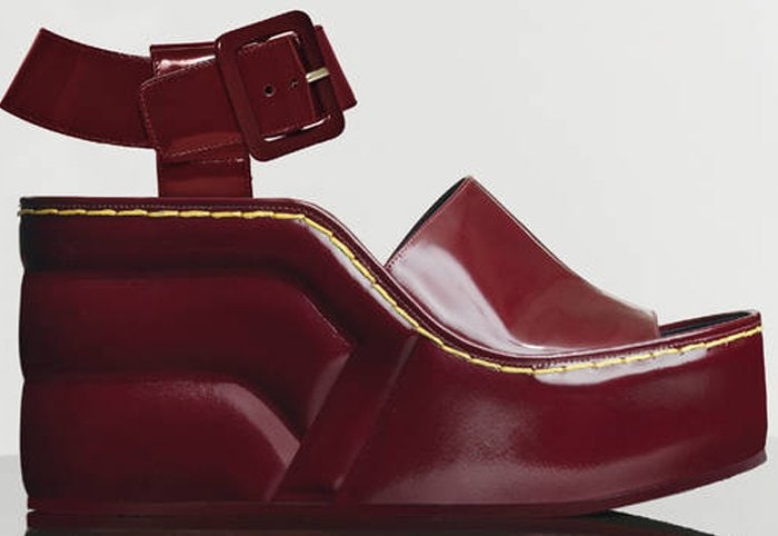 The padded burgundy Céline wedge sandal combines chunky proportions with architectural lines for a bold Fall 2014 statement shoe