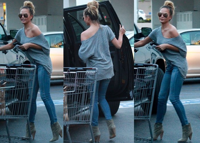 Skinny jeans and Isabel Marant "Roxann" suede booties elevate an otherwise casual supermarket outfit