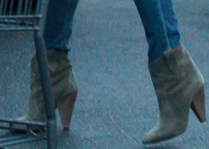 The washed-suede Roxann booties combine a sharply tapered toe with Isabel Marant's signature sculpted cone heel