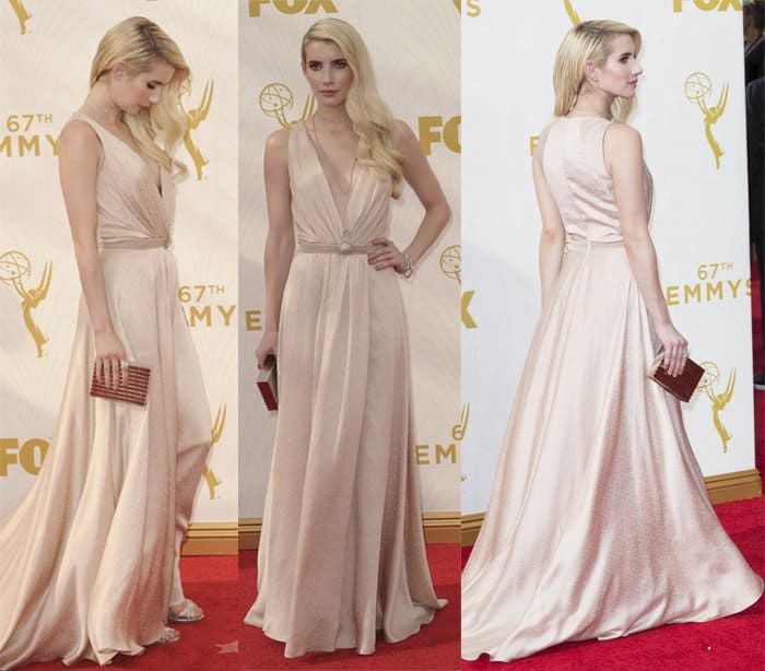 Emma Roberts channels old Hollywood glamour in a custom Jenny Packham gown featuring a soft blush hue, a plunging neckline, and an elegant flowing silhouette