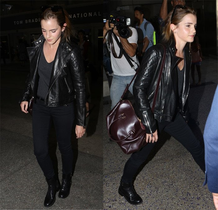 Emma Watson keeps it sleek in a black leather moto jacket, AG Sateen leggings, and lace-up Saint Laurent Patti ankle boots at LAX