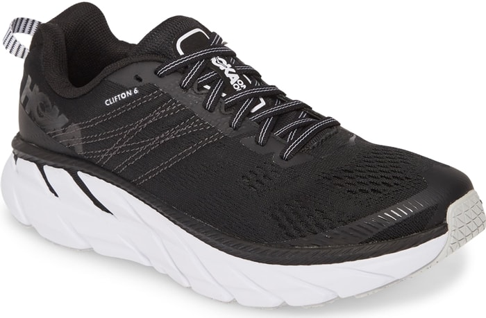 Hoka One One Clifton 6 Running Shoe — A lightweight, max-cushion trainer featuring Hoka’s distinct rocker sole and plush EVA midsole, designed to deliver a smooth, stable ride for daily runs and long-distance comfort