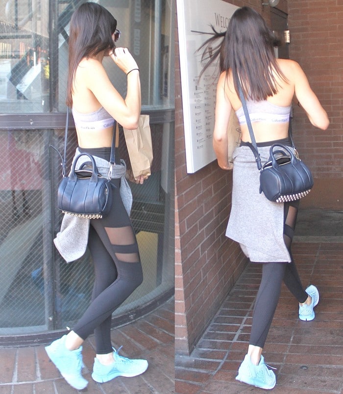 Kendall Jenner perfectly encapsulates the athleisure trend, rounding off her workout-inspired look with a stylish bag and classic Nike sneakers