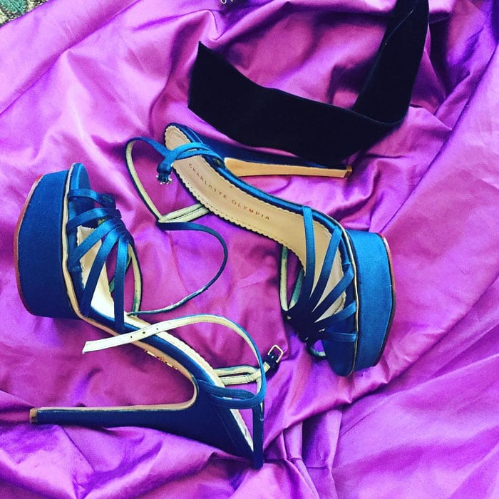 Charlotte Olympia platform sandals rest atop Maggie Gyllenhaal’s vibrant Oscar de la Renta gown—final touches before her 2015 Emmys red carpet moment
