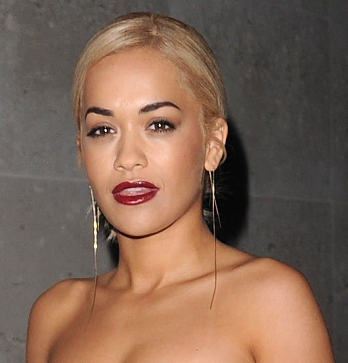 Rita Ora's bold burgundy lips and simple hairdo worked wonders, providing a sultry finishing touch as she left the Radio 1 studios