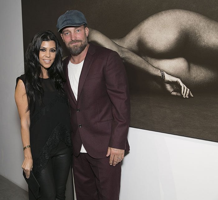 Kourtney Kardashian and Brian Bowen Smith in front of Brian's nude portrait of Kourtney