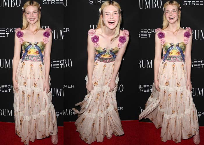 Playing to the cameras, Elle Fanning lets the soft movement of her flowing skirt and youthful styling define the look’s effortless charm