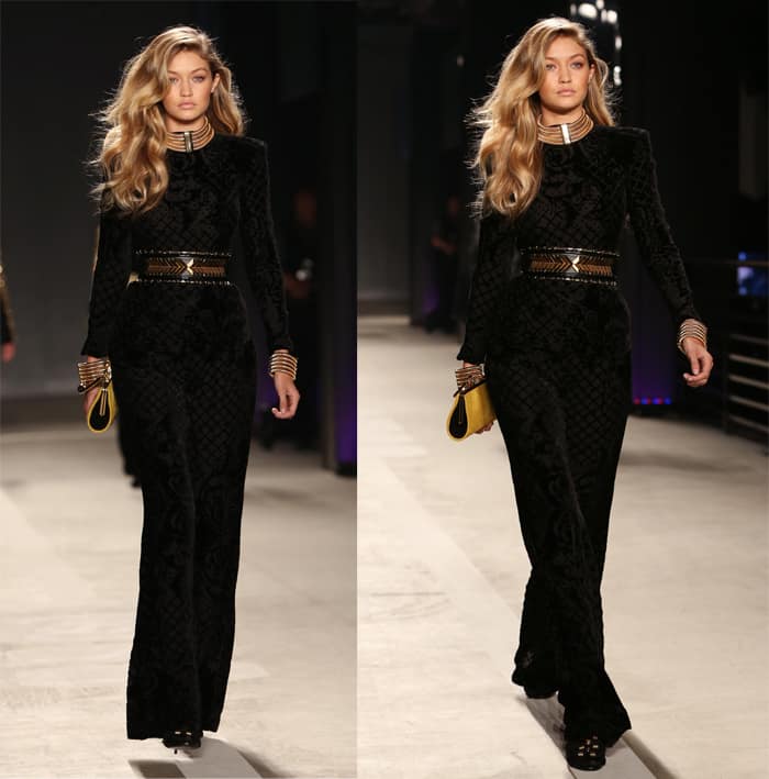 Model Gigi Hadid walks the runway wearing BALMAIN X HM collection during the launch event at 23 Wall Street