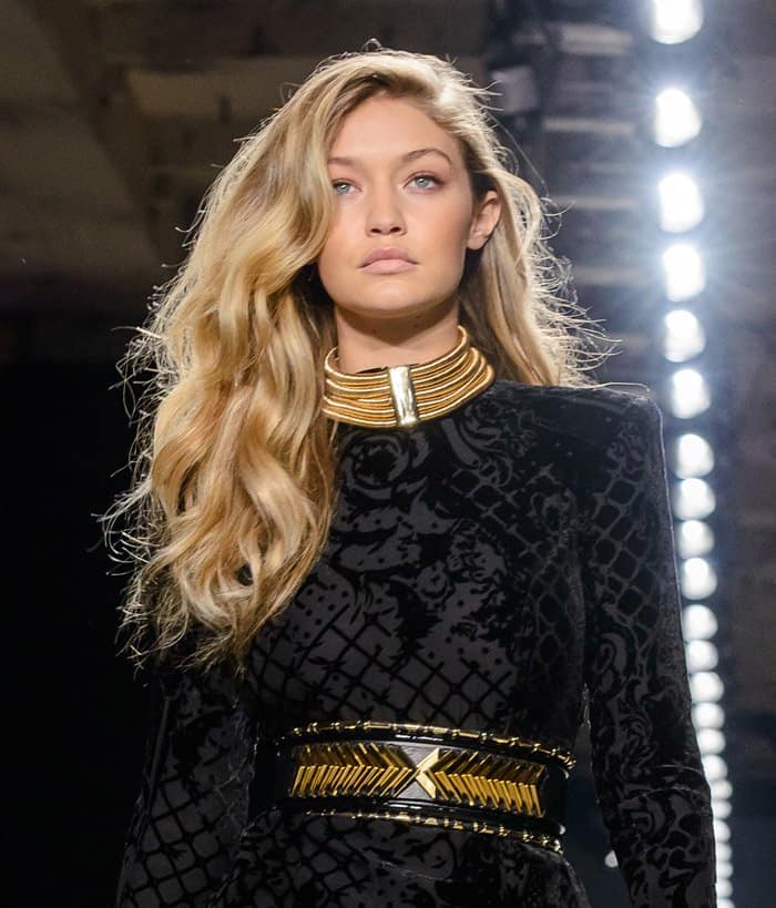 Gigi Hadid wears a long-sleeved flared jumpsuit