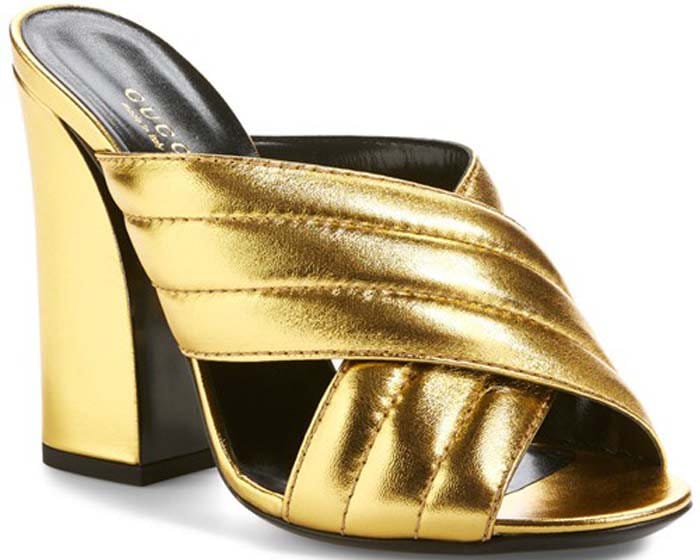 Rendered in metallic gold, the Gucci “Sylvia” sandal transforms the same silhouette into a bolder, evening-ready option with added shine