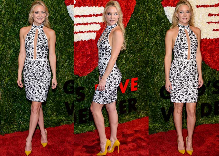 Kate Hudson paired a black-and-white floral Michael Kors halter dress with mustard patent Christian Louboutin “So Kate” pumps that inject a bold, modern contrast into the classic silhouette