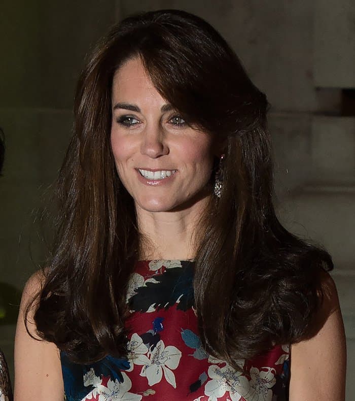 Kate Middleton's glossy brunette locks and subtle makeup highlight her natural elegance, perfectly complementing her floral Erdem gown at the 100 Women in Hedge Funds Gala