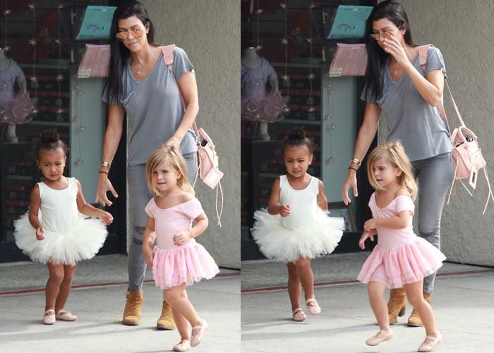Kourtney Kardashian coordinates effortlessly with daughter Penelope Disick in a casual gray tee and Saint Laurent boots, while the little ballerina twins in a blush pink tutu alongside cousin North West in white