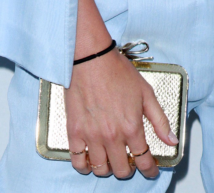 Miranda Kerr totes a Christian Louboutin Fiocco embellished clutch