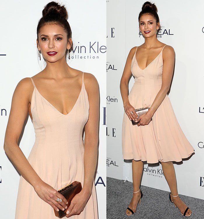 Nina Dobrev accessorized with drop earrings and a ring by David Yurman