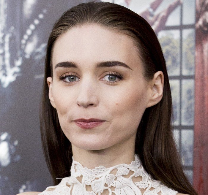 Rooney Mara keeps her beauty look understated with slicked-back hair, defined brows, and soft neutral makeup at the New York premiere of Pan