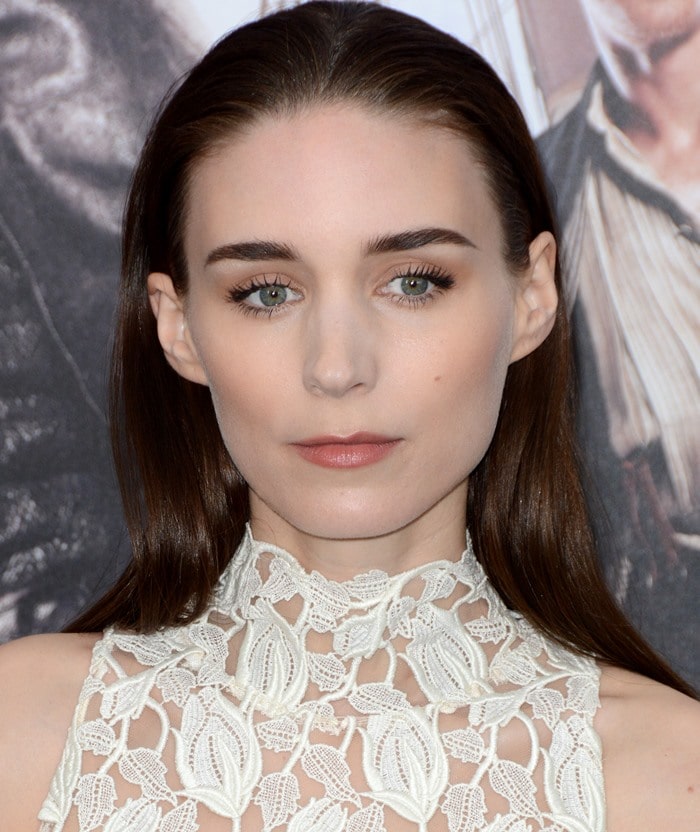 A closer view highlights the intricate white floral lace and high neckline of Rooney Mara’s Giambattista Valli Fall 2015 Couture dress