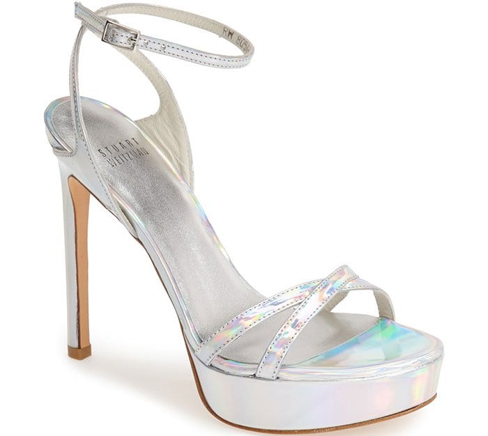 A prismatic silver finish adds futuristic flair to a scene-stealing platform sandal topped with a slim ankle strap