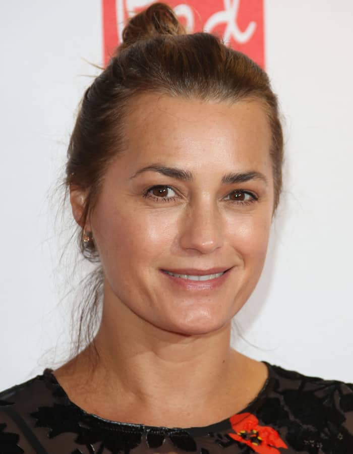 Yasmin Le Bon opts for a natural beauty look with minimal makeup and a simple top-knot hairstyle