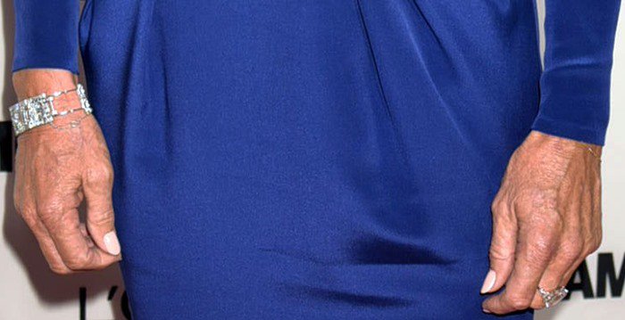 Caitlyn Jenner accessorized her Moschino gown with sparkling diamond bracelets and rings, adding a touch of timeless glamour to her red-carpet look