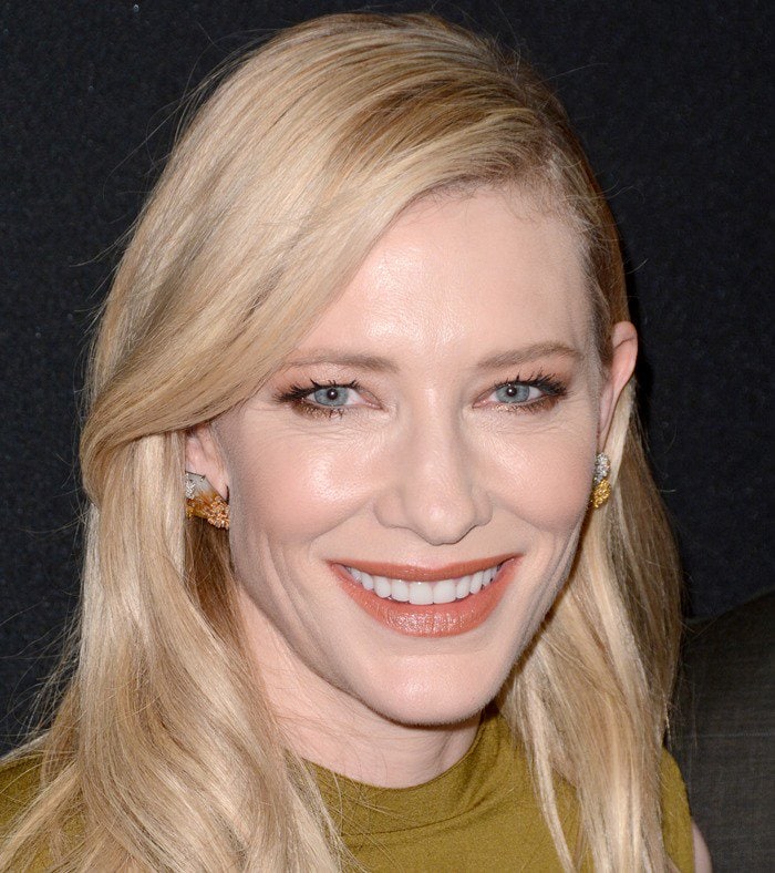 Cate Blanchett completed her Carol premiere look with softly waved blonde hair and diamond-and-yellow-jade Lorraine Schwartz triangle earrings