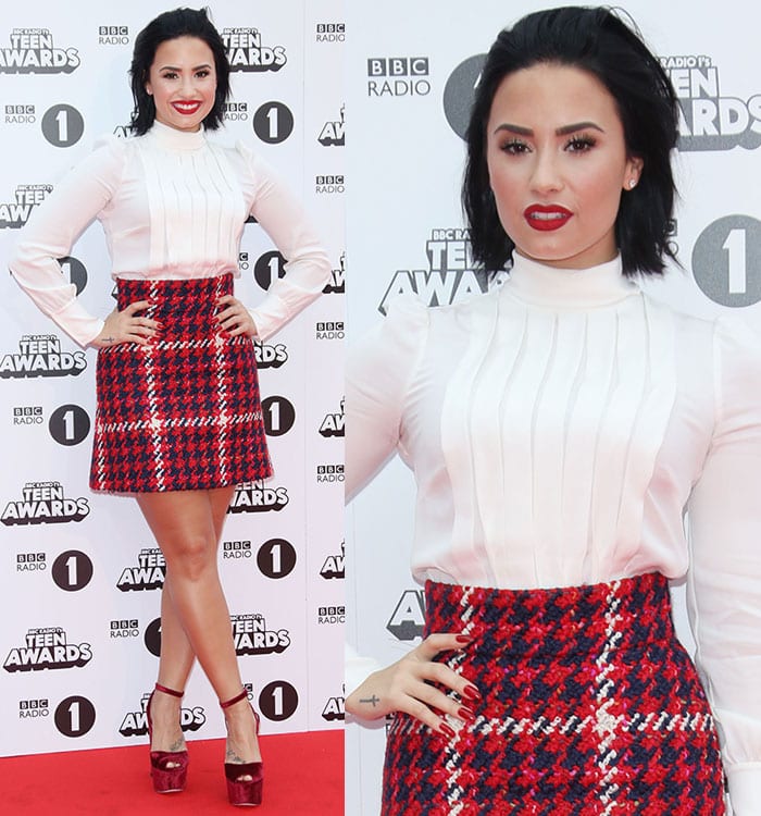 Demi Lovato elevates her retro-chic look with bold platform heels, proving that a statement shoe can perfectly complement a structured mini skirt