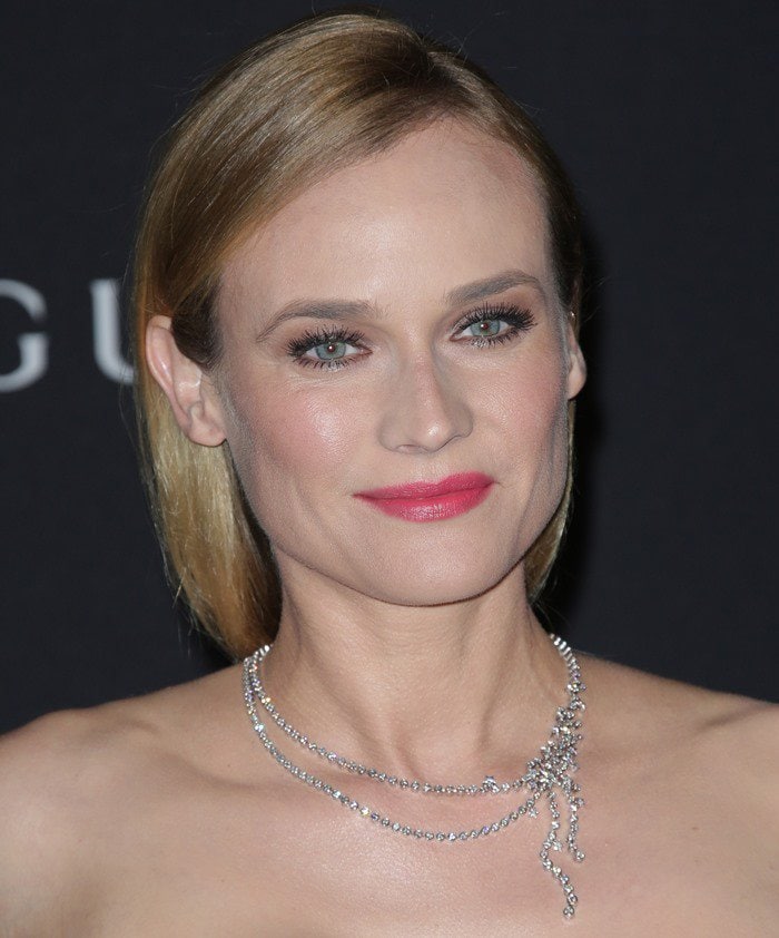 Diane Kruger elevates her sleek red-carpet look with Chanel Fine Jewelry’s delicate “Ciel Etoilé” necklace, its cascading diamond strands adding a subtle celestial shimmer against her bare décolletage