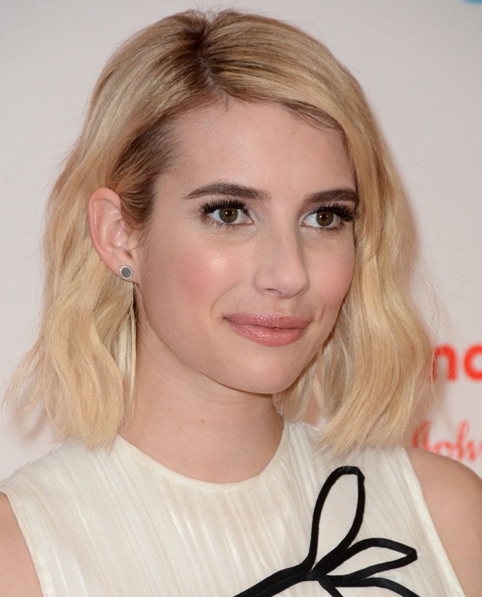 Emma Roberts wears her hair down at Johnson Johnson's “Donate A Photo Holiday Kick-off”