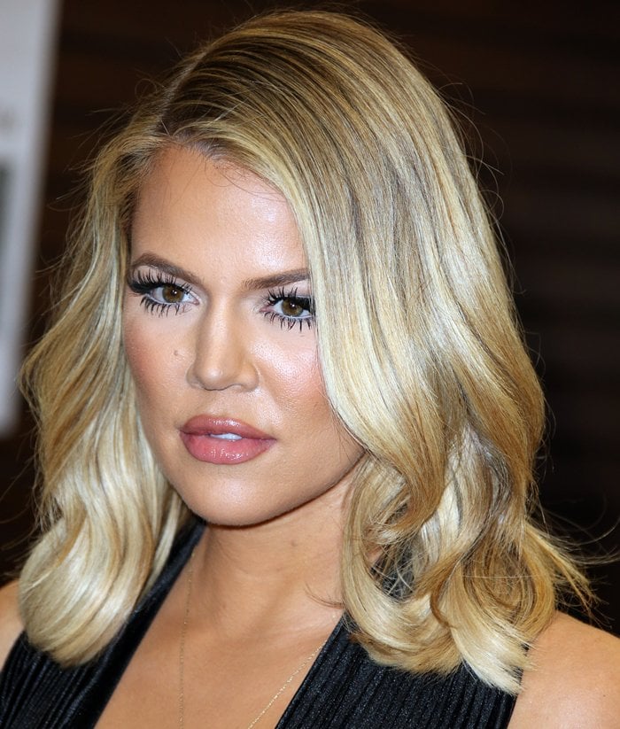 Khloé Kardashian wears her hair down at a book signing at Barnes Noble