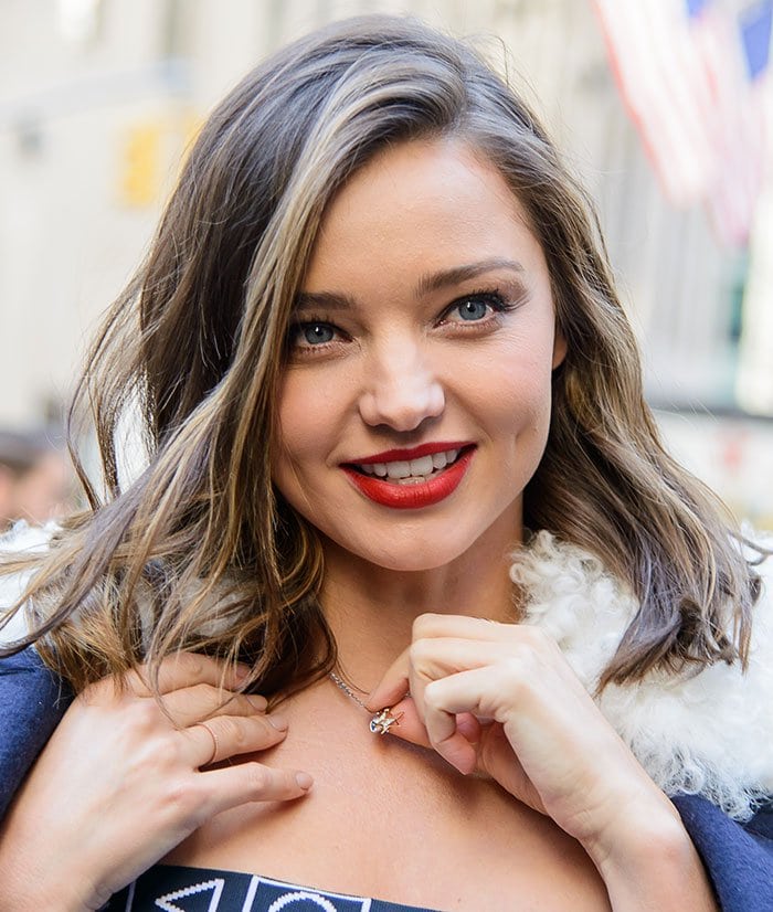 Miranda Kerr wears her hair down as she attends the Rockefeller Center Christmas Tree's Swarovski Star unveiling