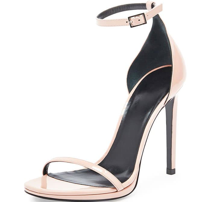 In a soft blush finish, the Jane sandal avoids sweetness by pairing delicate straps with a sharply pitched heel and architectural silhouette
