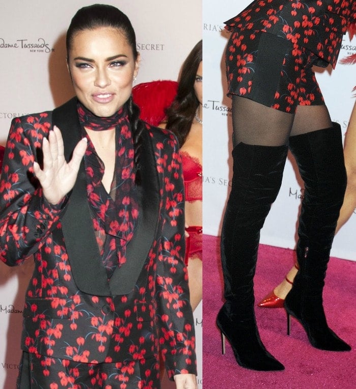 Adriana Lima styled her Rachel Zoe short suit with sleek black suede Gianvito Rossi over-the-knee boots, creating a sharp, leg-lengthening silhouette at the Madame Tussauds unveiling