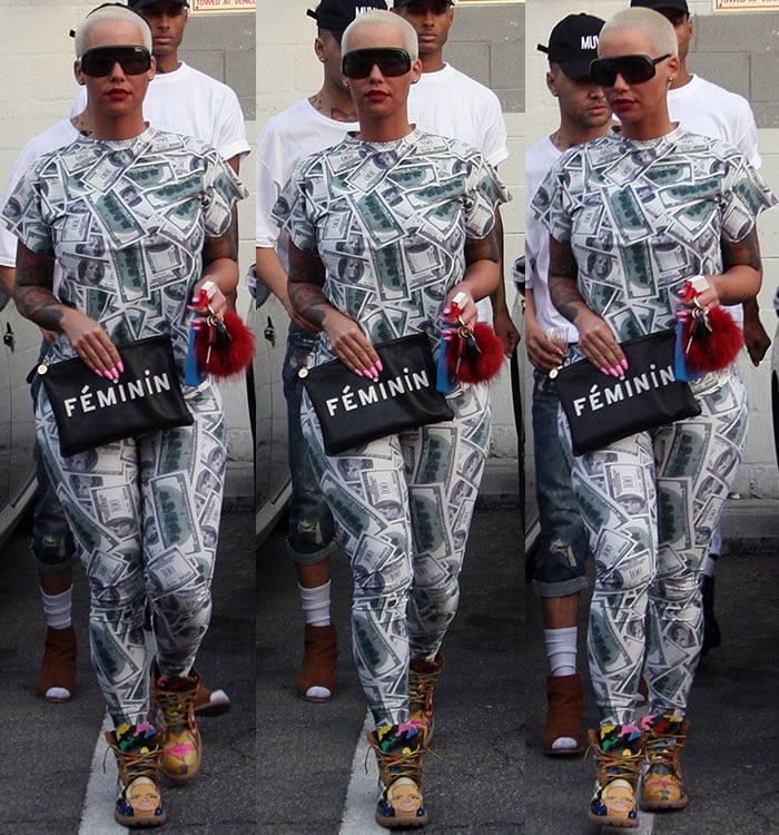 Amber Rose wears a $100 bill-printed jumpsuit while out in Beverly Hills