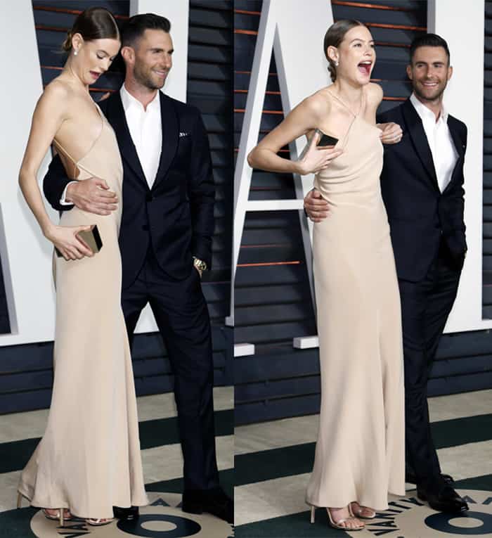 Model Behati Prinsloo shares a laugh with husband Adam Levine after narrowly dodging a nip slip in her slinky Calvin Klein gown at the 2015 Vanity Fair Oscar Party in Beverly Hills