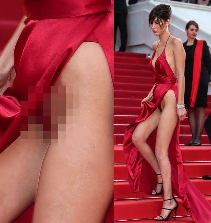 Bella Hadid’s daring red Alexandre Vauthier gown revealed more than expected as she ascended the Cannes stairs, resulting in an unintentional flash that left little to the imagination