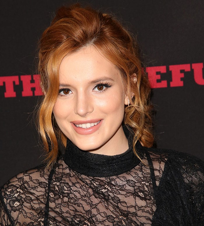 Bella Thorne wears her red hair in curls at the premiere of The Weinstein Company's "The Hateful Eight"